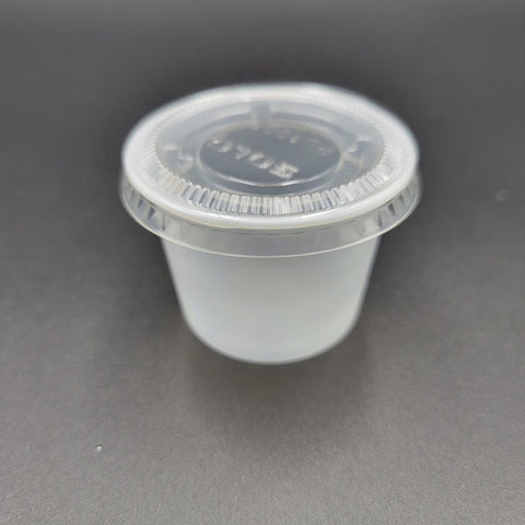Dart Mfg. Clear Small Plastic Portion Cup Lid for 1 oz. Cups PL100N - 2500/Case